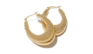 PRODUCT FEATURES:  316L High-Grade Stainless Steel  Hoop Length 2 Inches Hoop Opening 1 Inch Earring Width: 3mm Weight: 4.9 grams (0.17) Oz Water-Resistant Tarnish-Free  *Extremely Lightweight.  Designer's Notes: Be bold and stylish with our Chunky Lightweight Gold Stripe Design Earrings and wear them every day or for any occasion!