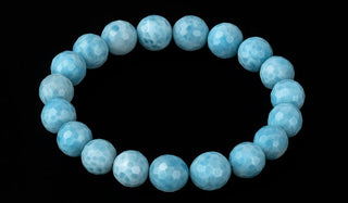 Blue beaded bracelet on a black background Luxury Faceted Larimar Natural Gemstone Bracelet