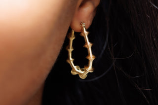 PRODUCT FEATURES:  316L High-Grade Stainless Steel  Hoop Length 1.5 Inches Hoop Opening 1 Inch Bamboo Width: 3mm Weight: 2 grams Water-Resistant Tarnish-Free  *Extremely Lightweight.  Designer's Notes: Be bold and stylish with our Lightweight Slinky Design Earrings and wear them every day or for any occasion!