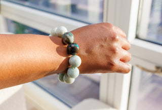 Woman wearing Luxury Burmese Jade & Chrysocolla Natural Gemstone Bracelet