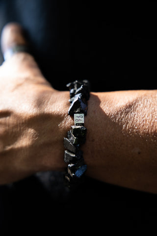 Alt= Male wearing Black tourmaline natural Gemstone Bracelet.