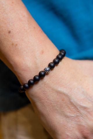 Man wearing Onyx Balinese Bracelet.