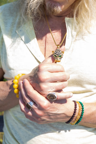 Man wearing Gold Crystal Jaguar Necklace