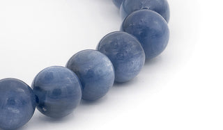 Alt= Kyanite Natural Gemstone Bead Close up.