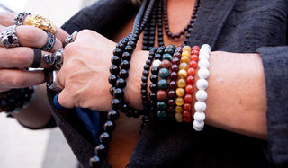 male wearing natural stone bracelets