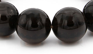 Alt= Smoky quartz beads close up
