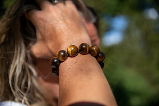 Alt= Male Model Wearing Tigers Eye Natural Gemstone Bracelet
