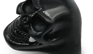 black skull ring close up