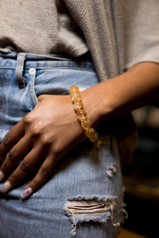 Woman wearing Citrine Gemstone Bracelet.