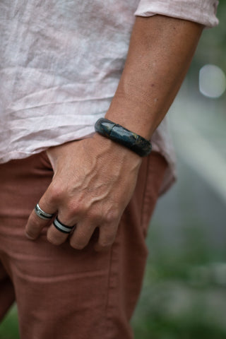 Alt= Male model wearing blue tigers eye flagstone bracelet.