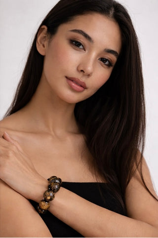 asian woman wearing Luxury Faceted Bronzite Natural Gemstone Bracelet