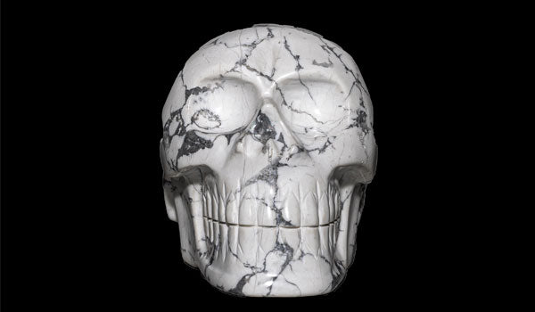 Our Howlite Gemstone Skull Sculpture is hand-carved and perfect for decorative display in your professional space or home. Designed with original Howlite from Mexico all markings are original and natural.