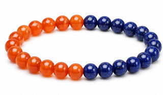 Bracelet with alternating orange and blue beads on a white background