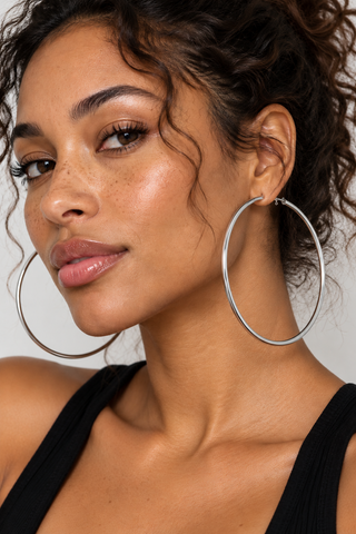 Model wearing Auden hoop earrings