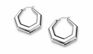 Pair of silver hexagonal hoop earrings on a white background