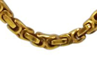 gold bike chain close up img