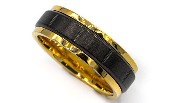 black and gold spinner ring