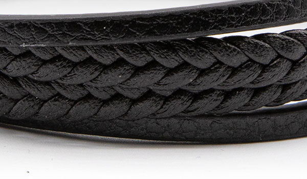 Alt=Black leather bracelet close up.