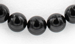 Black toumaline gloss natural stone necklace close up