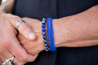 Alt=Male wearing Blue Bracelets