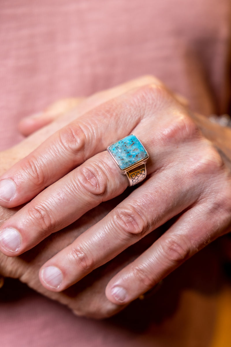 Man wearing Sterling Silver Turquoise Ring.