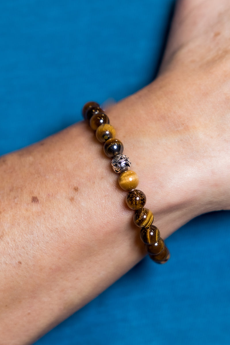 Man wearing Tigers Eye Balinese Bracelet.