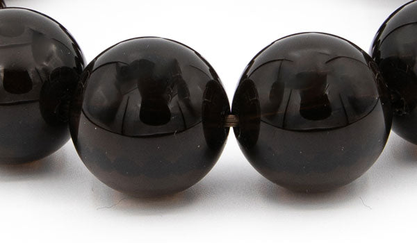 Alt= Smoky quartz beads close up