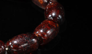 Luxury Red Oval-Shaped Baltic Amber Bracelet close up