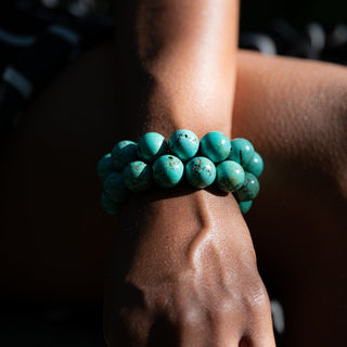 Alt= Female Model wearing Tibetan Turquoise Gemstone Bracelets.