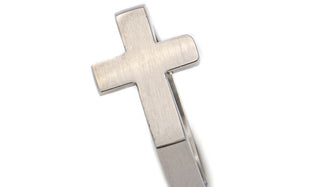 silver cross ring close up 