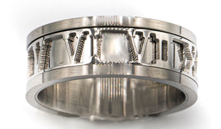 silver Roman numeral ring close up 