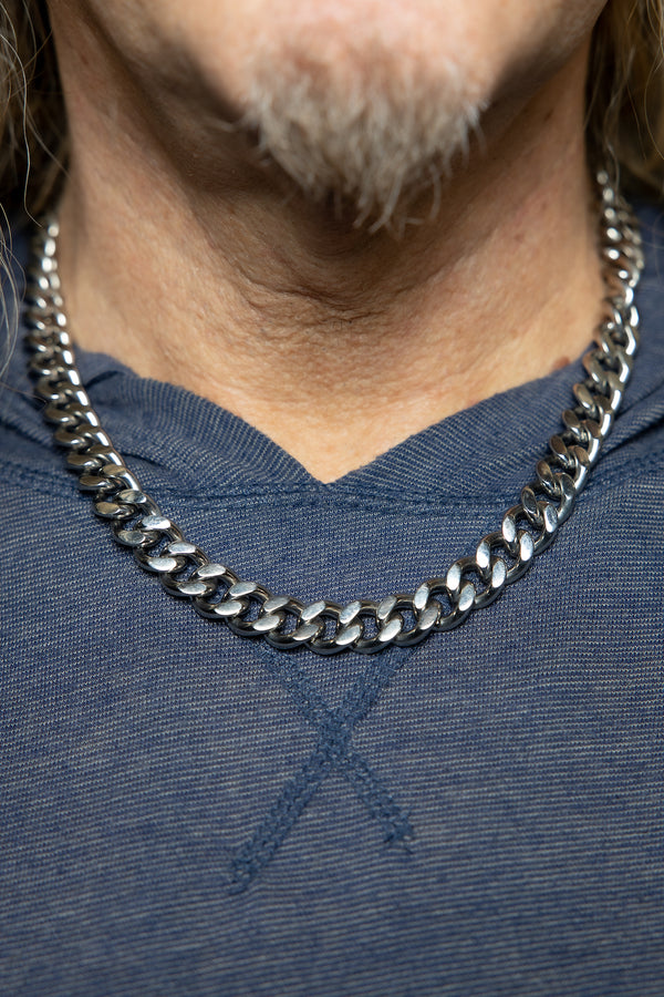 Man wearing Silver Cuban Chain.