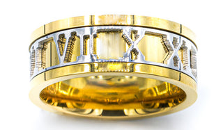gold Roman numeral ring close up