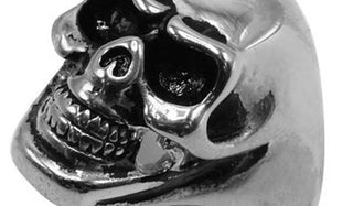 silver skull ring close up